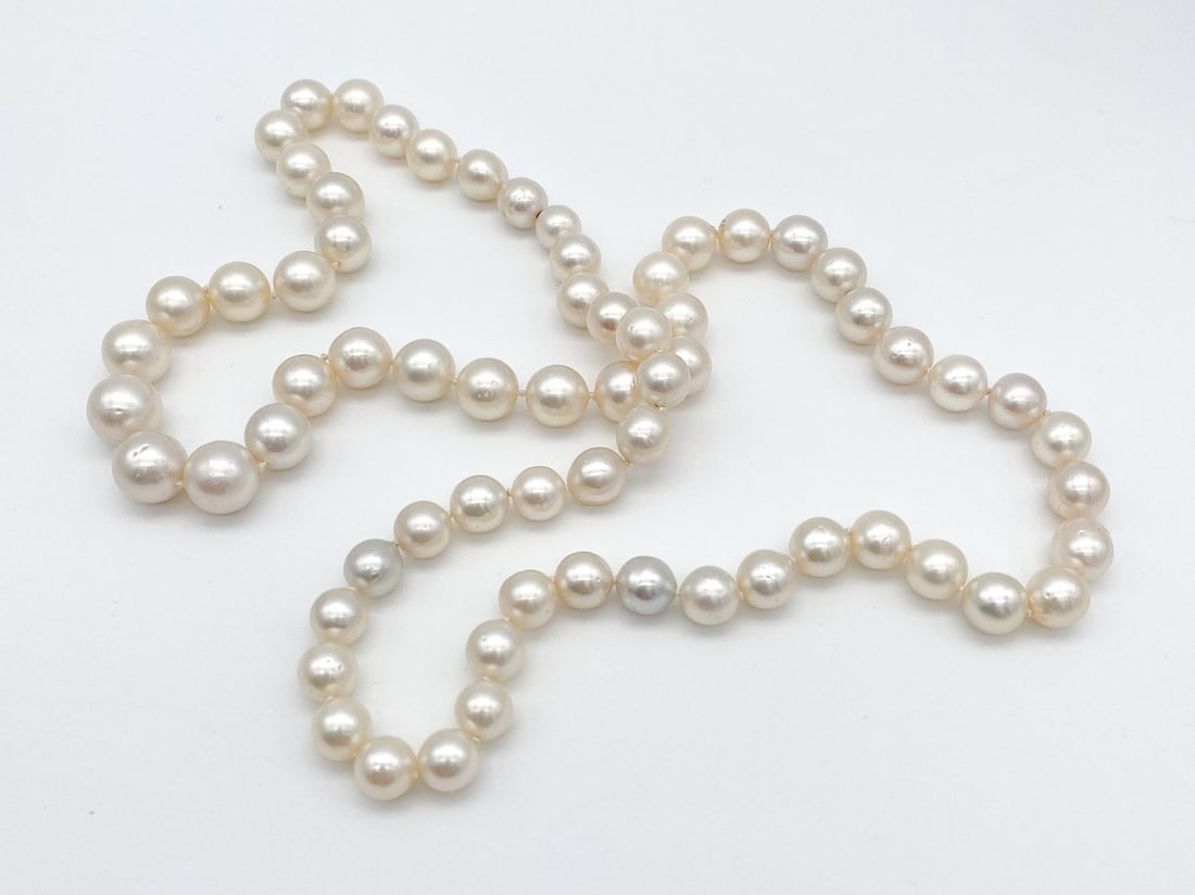 White South Sea Pearl Necklace, Aaa Quality: White South Sea Pearl Necklace, AAA Quality, Comprised Of 67 10-14mm Pearls, 156.4g. Eternity Strand Approx 33 Inches.