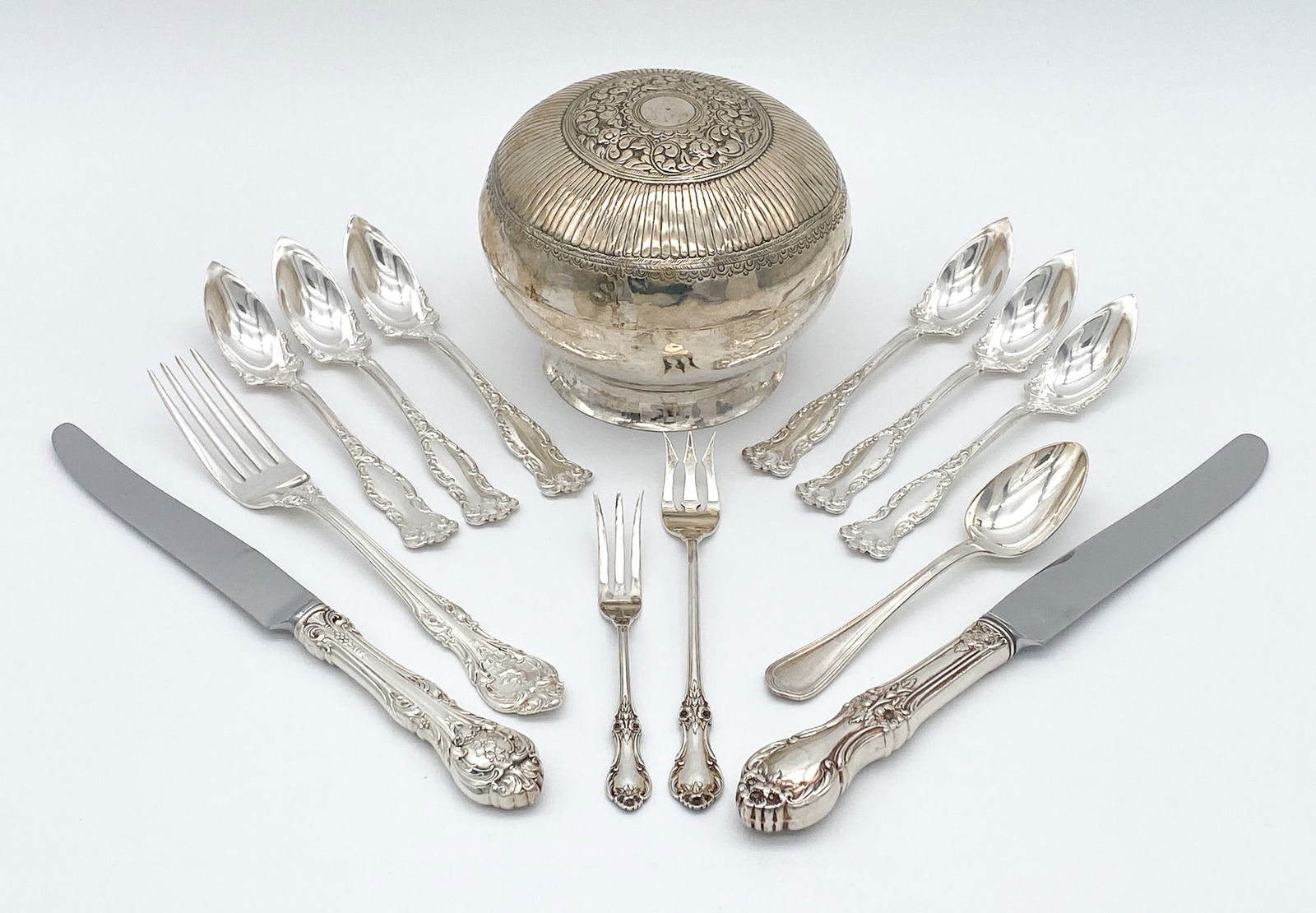 Group Of 13 Silver Items, Gorham, International: 13 Pieces: Antique Betel Nut Box, Probably Malaysian, 19th Century, Repousse Domed Cover, Spreading Foot, Height 4.5, Diameter 5 Inches, Approximate Weight 167.7 Grams, Lacks Chain Or Hinge Attachment