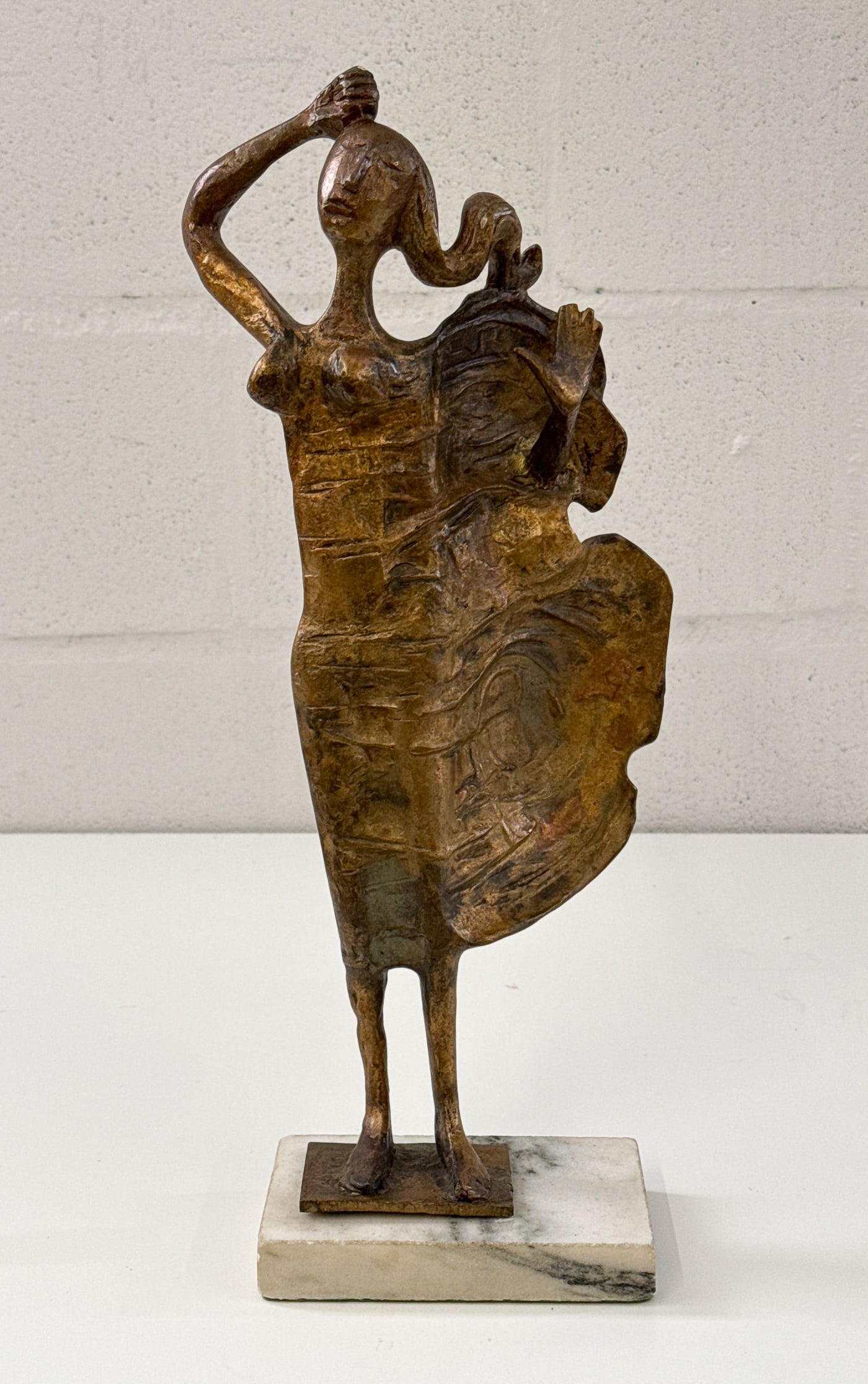 Attr. Milton Hebald, American, 1917-2015: Attr. Milton Hebald, American, 1917-2015, Ribbon Breeze, Standing Woman, Bronze With Gilt, Unsigned, 17 X 6 X 2 Inches, White Marble Plinth 18 X 6 X 4 Inches Overall, Bronze Base With Fissure, Areas O