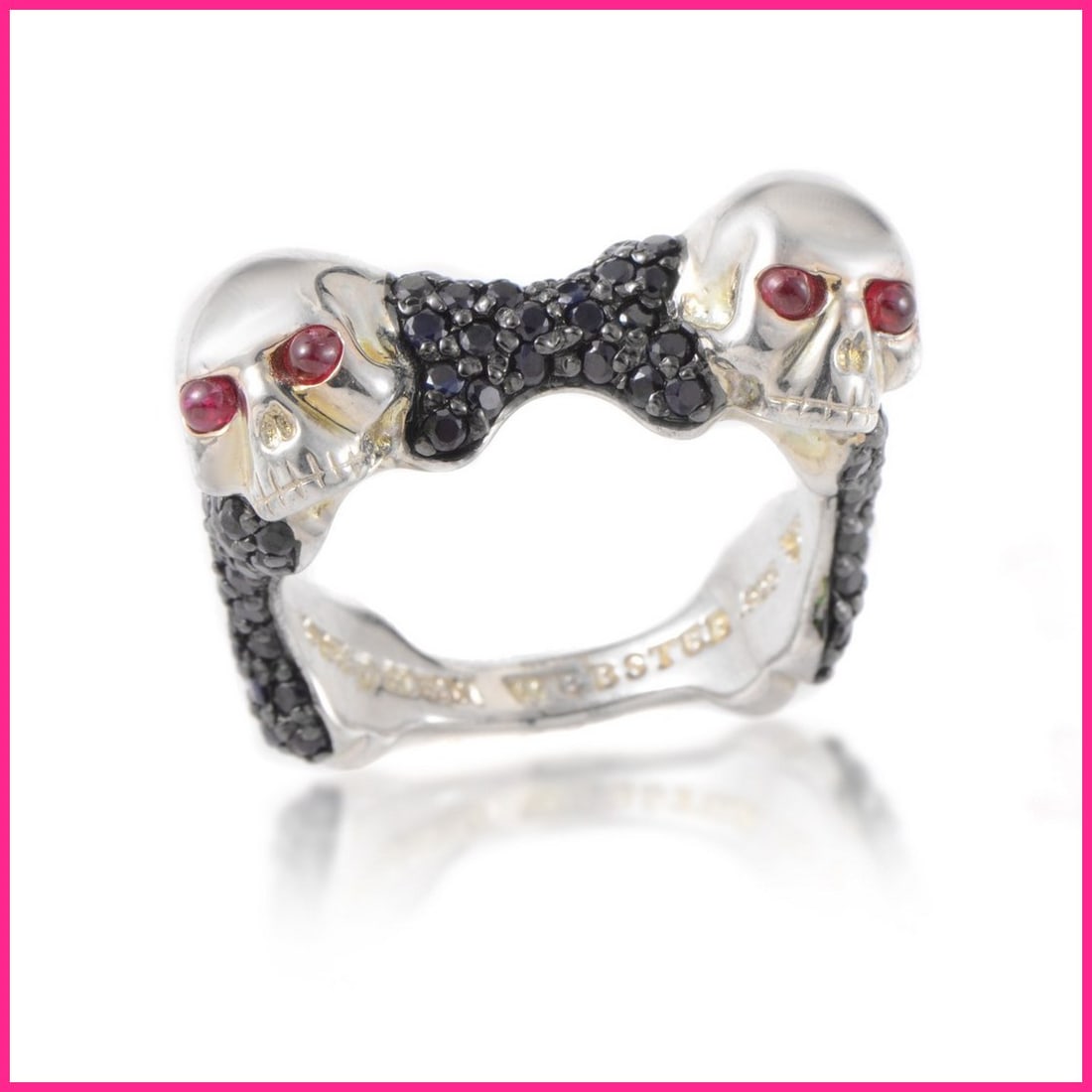 Stephen Webster Skull & Bones Men's Sterling Silver Ruby & Black Sapphire Ring: Designed for men with strong focus on offbeat masculine elements, this impressive Stephen Webster ring is made of silver and boasts eye-catching decoration in form of two skulls set with four rubies t