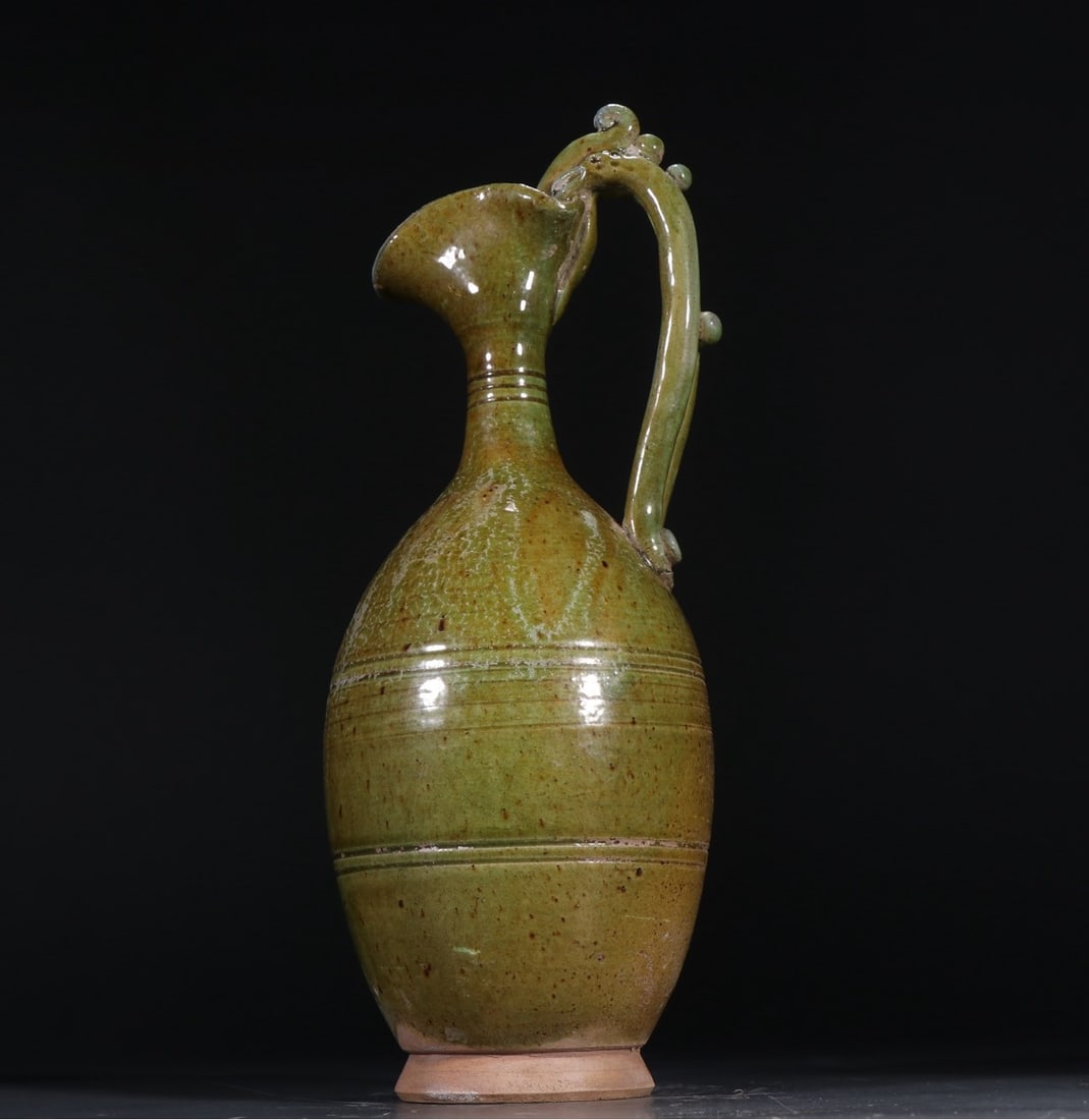 A piece of Sui Dynasty tea glazed single dragon holding pot (1 of 9)