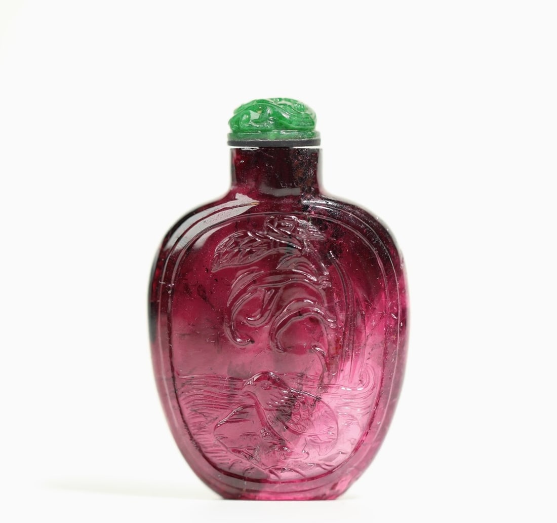 A piece of Qing Dynasty "live and work in peace" rubellite tourmaline snuff bottle with jade dragon (1 of 11)