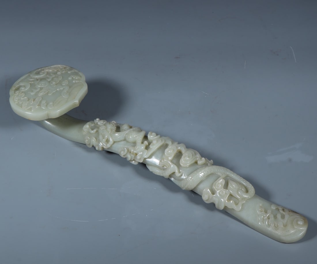 A relief dragon pattern ruyi ornament of Hetian jade (1 of 9)