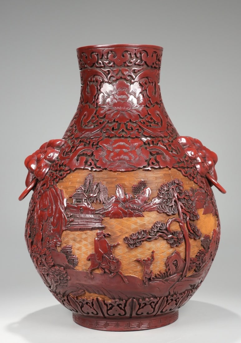 A Qing Dynasty red lacquerware window-opening figure animal ear zun bottle (1 of 9)