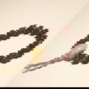 An old Vajra Bodhi with inlaid bracelet: Old Vajra Bodhi with inlaid bracelet SIZE: 1.7cm W:90g (The Dimensions Of All Batches Are Manually Measured.If You Need More Detailed Information, Please Contact Our Customer Service Before