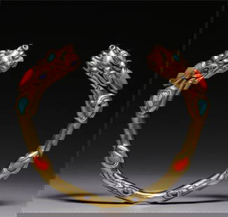 A Tang Dynasty pure gold inlaid coral turquoise double dragon bracelet: Tang Dynasty pure gold inlaid coral turquoise double dragon bracelet SIZE: OutSide D:9cm lnside D:7.5cm W:1.4cm W:134g (The Dimensions Of All Batches Are Manually Measured.If You Need More