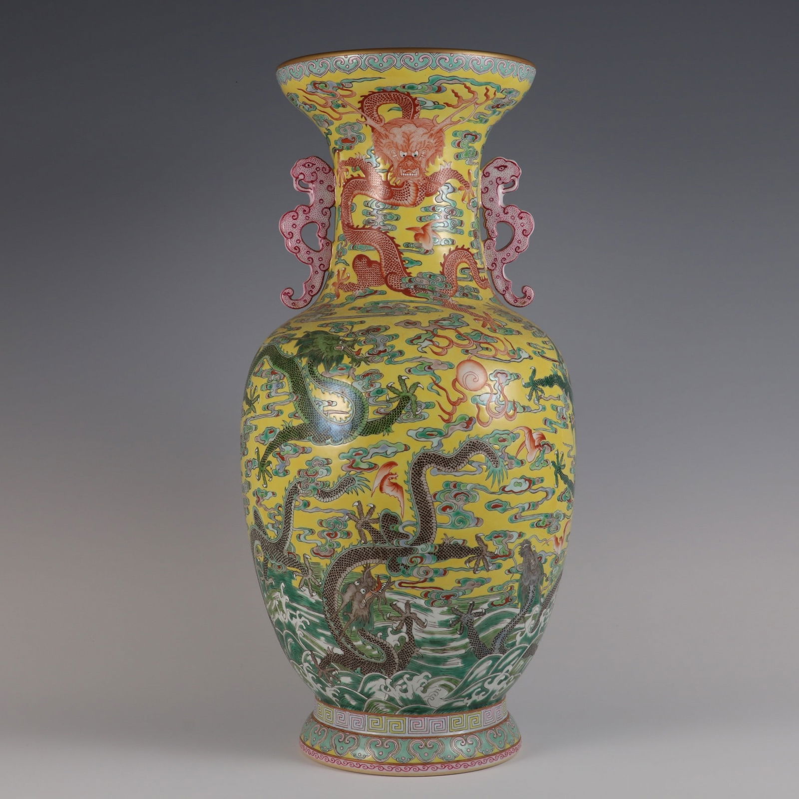 A Yellow Ground Pastel Nine Dragons Pattern Amphora made in the Qianlong year of the Qing Dynasty: Qing Dynasty Qianlong year made yellow ground pastel nine dragon pattern amphora SIZE: H:49.5cm Belly D:23cm Mouth D:18.5cm (The Dimensions Of All Batches Are Manually Measured.If You Need More Detail