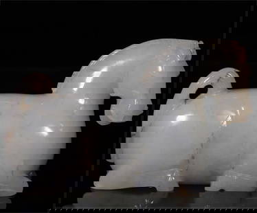 A Hetian white jade lying horse ornament from the Han Dynasty: Han Dynasty Hetian white jade lying horse ornaments Size: H:6cm L:9.5cm W:3.5cm W:243g (The Dimensions Of All Batches Are Manually Measured.If You Need More Detailed Information, Please Contact Our Cu