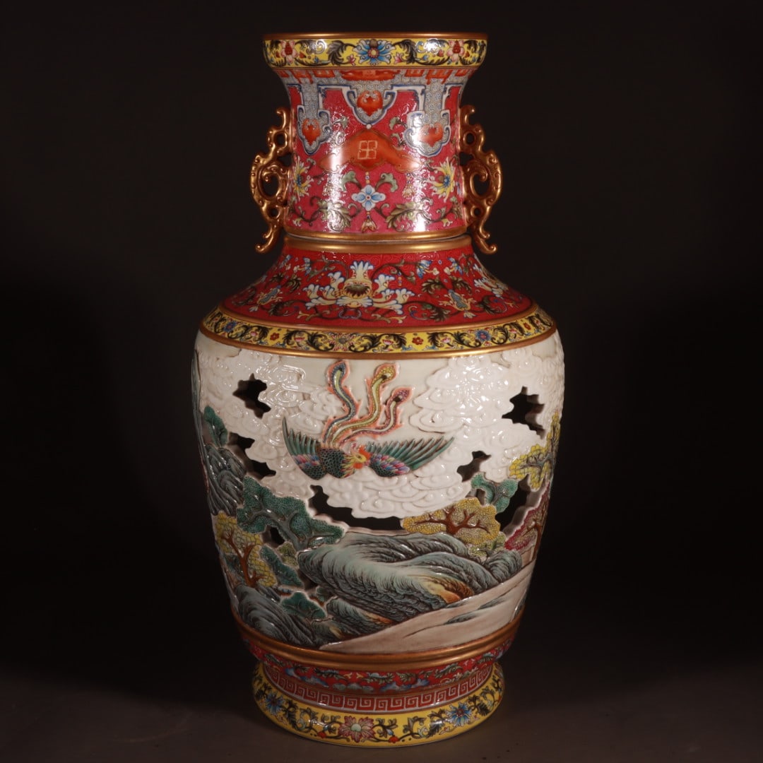 A Qing Dynasty Qianlong foreign color carmine red road carved porcelain hollow "There is a phoenix: Qing Qianlong's foreign color carmine red road carved porcelain hollow "Hundred Birds with Phoenix Ceremony" amphora turning heart vase Size: H:50cm Mouth D:16cm Belly D:26cm Bottom D:20cm (The Dimens