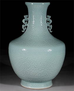 A pink blue glaze embossed entwined lotus flower long-necked amphora made in the Qianlong period of: Qing Dynasty Qianlong year pink blue glaze relief entangled lotus flower long-necked amphora obelisk vase Size: H:57cm (The Dimensions Of All Batches Are Manually Measured.If You Need More Detailed In