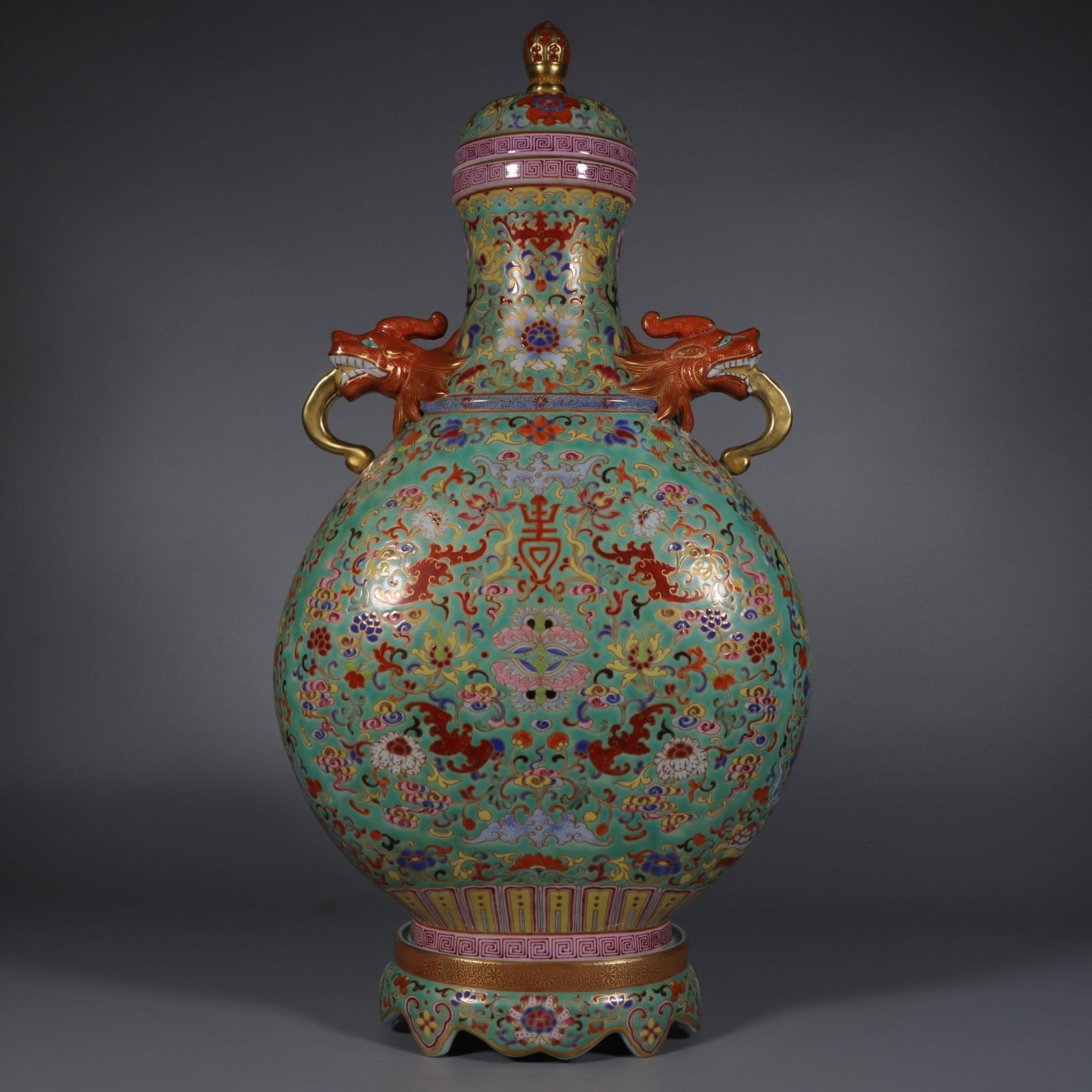 A Qianlong era pinched gold enamel colored entwined lotus flower Fushou pattern amphora: Qianlong year pinched gold enamel color entwined lotus flower Fushou pattern amphora Size: H:53.8cm Mouth D:9.8cm Bottom:15.3cm (The Dimensions Of All Batches Are Manually Measured.If You Need More De