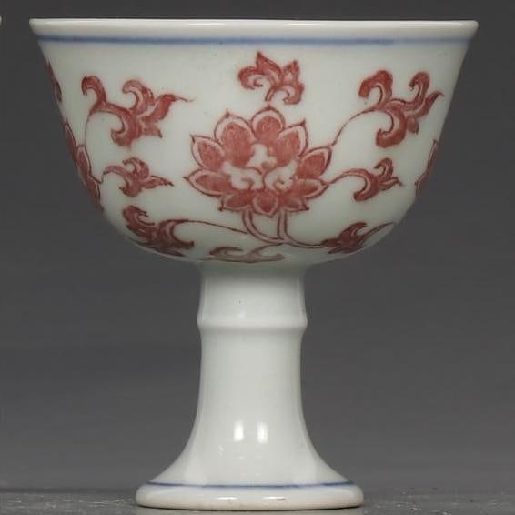 A glazed red lotus pattern goblet made in the Chenghua year of the Ming Dynasty: Glazed red lotus pattern goblet made in the Chenghua year of the Ming Dynasty Size:H:7.3cm Calibre:6.8cm (The Dimensions Of All Batches Are Manually Measured.If You Need More Detailed Information, Ple