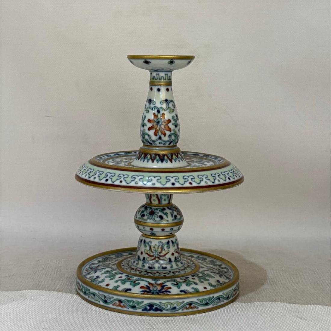 A blue and white candlestick made in the Qianlong period of the Qing Dynasty: Qing Dynasty Qianlong year blue and white candlestick Size:H:18cm D:13.5cm (The Dimensions Of All Batches Are Manually Measured.If You Need More Detailed Information, Please Contact Our Customer Servi