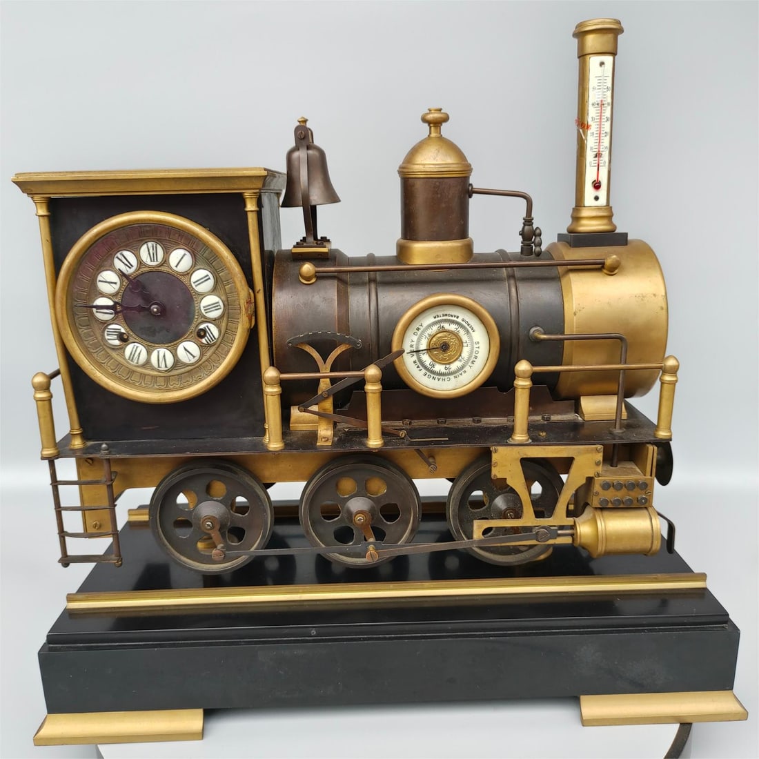 A fine copper locomotive clock (1 of 9)