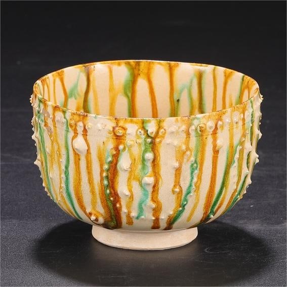 A three-color drum nail deep-bellied bowl from the Gongxian kiln in the Tang Dynasty (1 of 6)