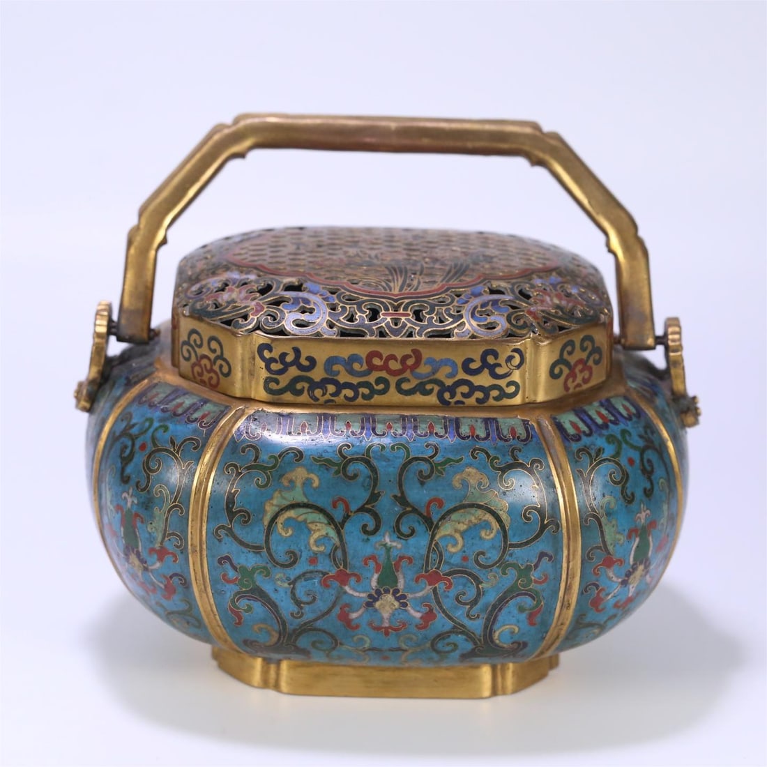 A Qing Dynasty copper tired cloisonné enamel entwined floral pattern hand stove (1 of 9)