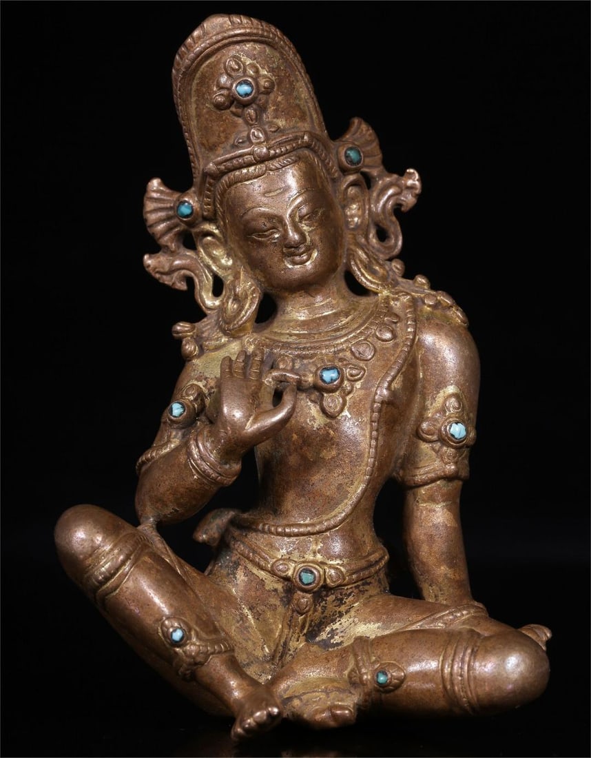 A seated statue of Guanyin in the Qing Dynasty in the style of copper clay and gold inlaid turquoise (1 of 9)
