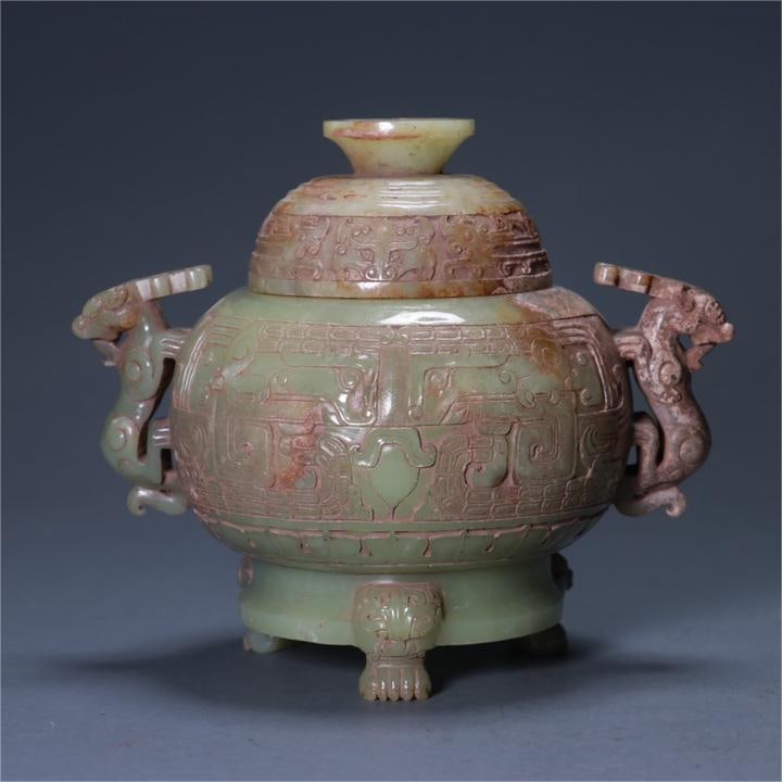 A beautiful Hetian jade light gluttonous pattern amphora: Exquisite Hetian jade light gluttonous pattern amphora Size:Ear distance:19cm Calibre:8cm Belly diameter:13cm H:15.5cm W:1169g (The Dimensions Of All Batches Are Manually Measured.If You Need More Det
