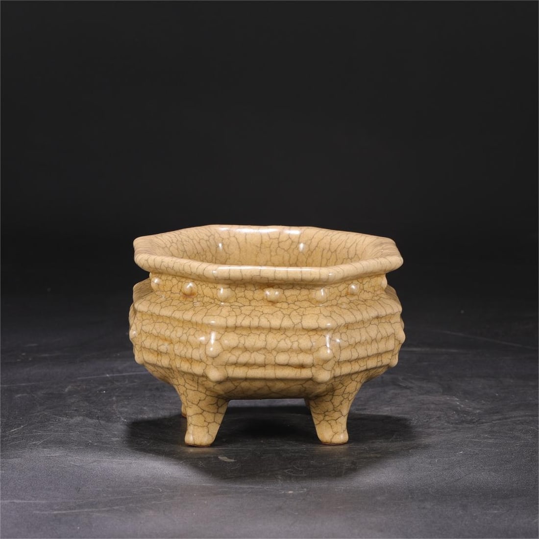 A beige glaze sacrificial ritual vessel from the Song Dynasty Ge kiln drum nail Bagua furnace: The beige glaze sacrificial ritual vessel of the Song Dynasty Ge kiln drum nail Bagua furnace Size:H:11cm Calibre:16cm (The Dimensions Of All Batches Are Manually Measured.If You Need More Detailed In