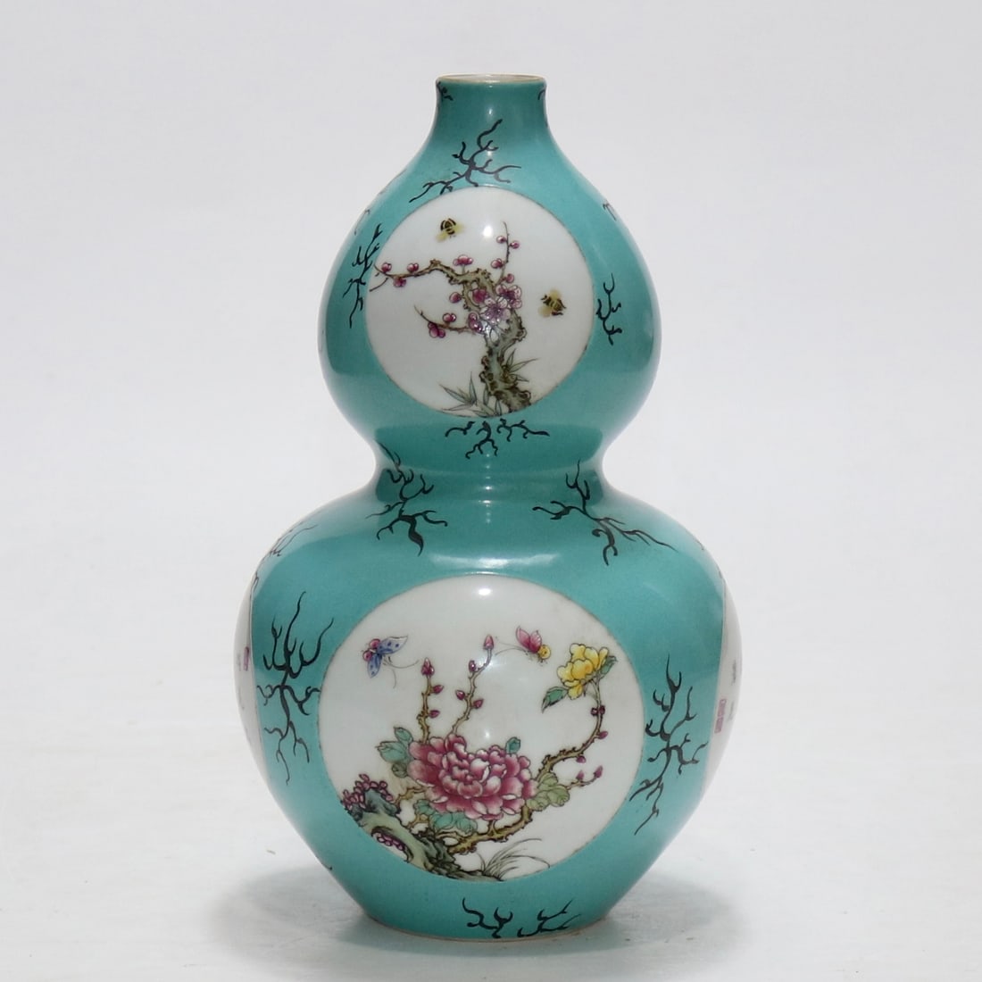 A Qing Dynasty Qianlong year turquoise green glazed floor window four seasons flower poetry gourd: Qing Dynasty Qianlong year turquoise green glazed floor window four seasons flower poetry gourd bottle SIZE: H:23cm (The Dimensions Of All Batches Are Manually Measured.If You Need More Detailed Infor