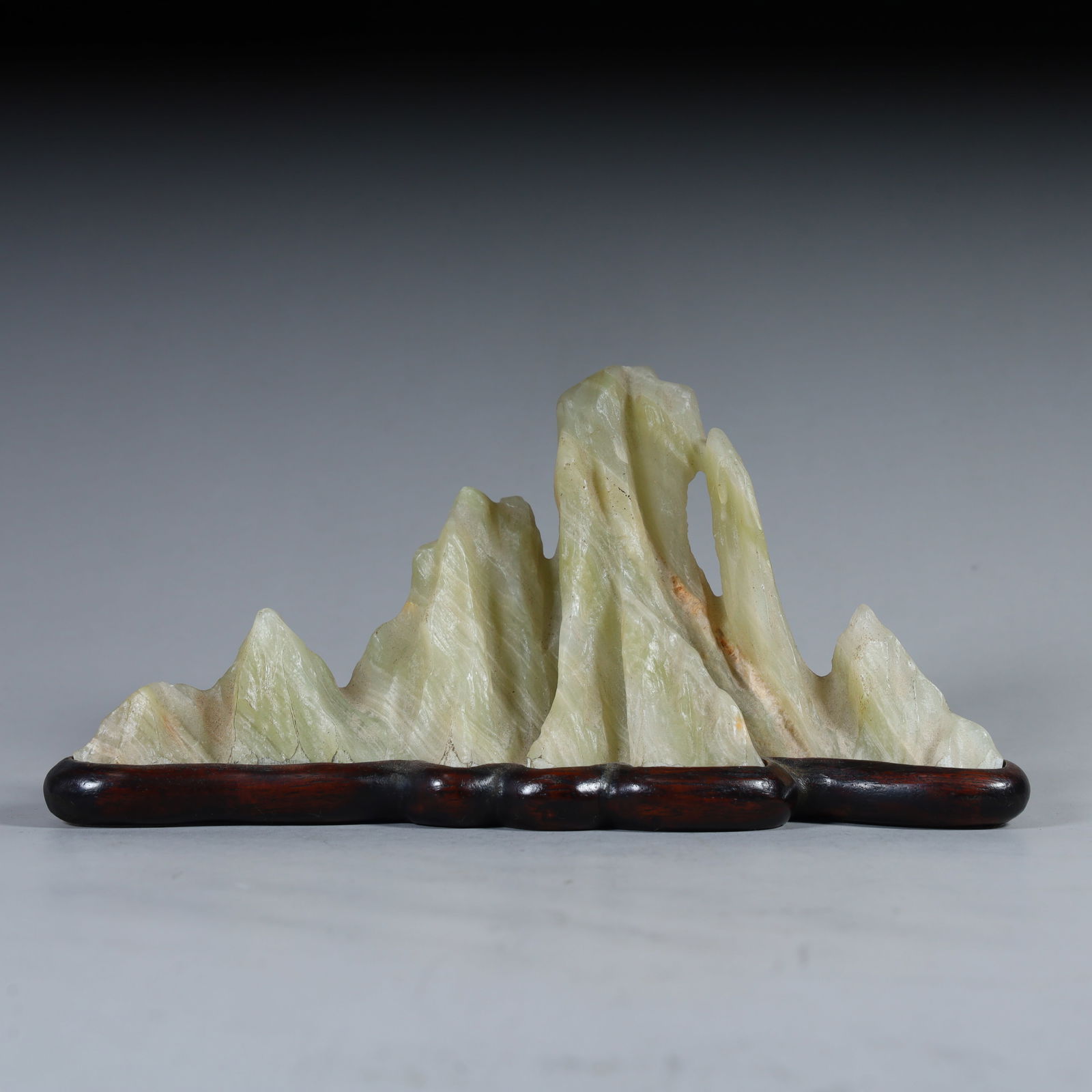 A late Qing Shoushan stone mountain-shaped pen holder (1 of 11)