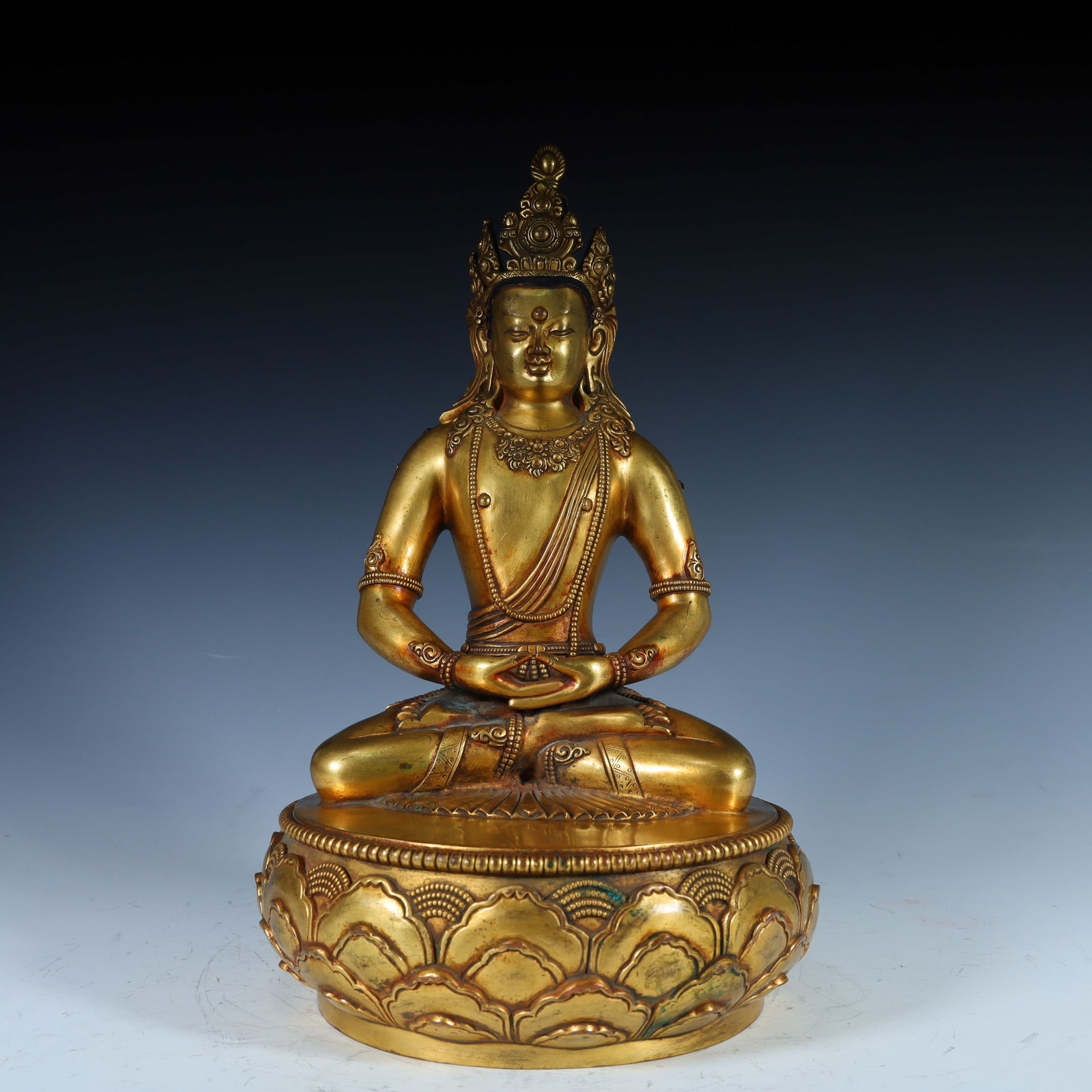 A copper-gilt longevity Buddha of the Qing Dynasty (1 of 13)