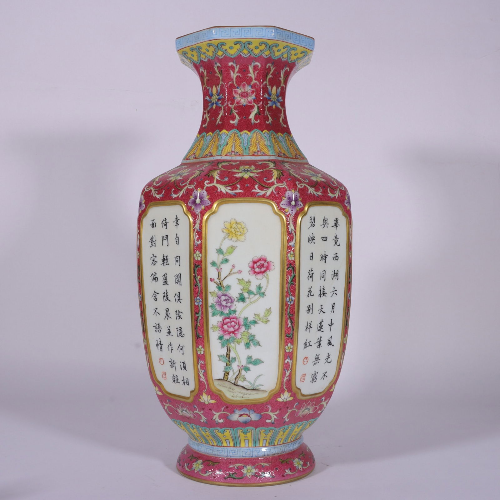 A Qing Dynasty Qianlong pastel carmine rolled road window flower poetry hexagonal vase: Qing Dynasty Qianlong pastel carmine red rolling road open window flower poetry hexagonal vase SIZE: H:45.2cm mouthD:15.5cm BellyD:21cm bottomD:14.3cm (The Dimensions Of All Batches Are Manually Measu