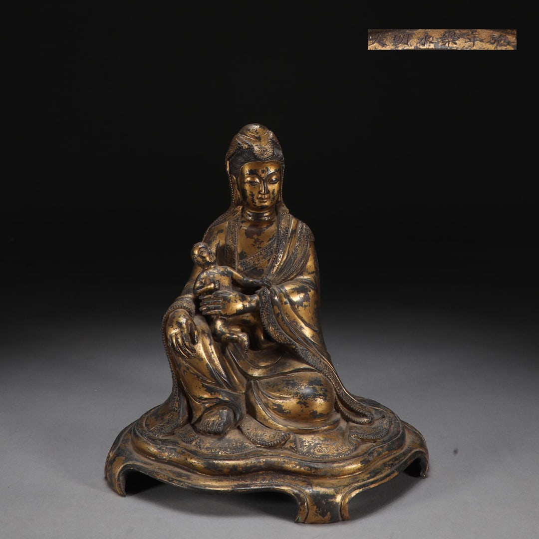 A seated statue of Guanyin in the Ming Dynasty with bronze tire mud gold (1 of 9)