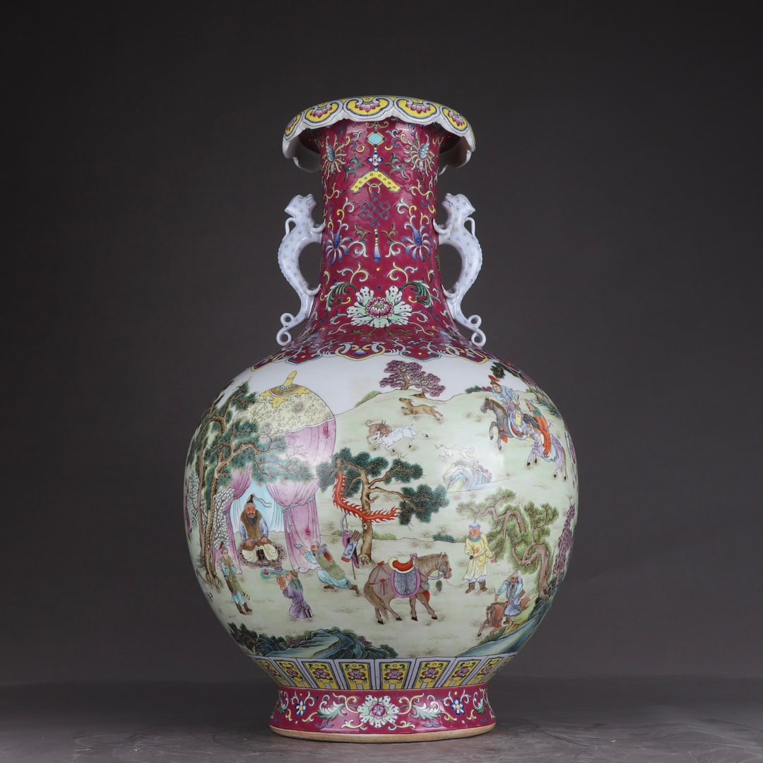 A Qianlong pastel carmine entwined lotus pattern open-window Tatar hunting dragon ear flower mouth: Qing Dynasty Qianlong pastel carmine red entwined lotus pattern window Tatar hunting picture dragon ear flower mouth vase SIZE: H:58cm BellyD:37cm (The Dimensions Of All Batches Are Manually Measured.