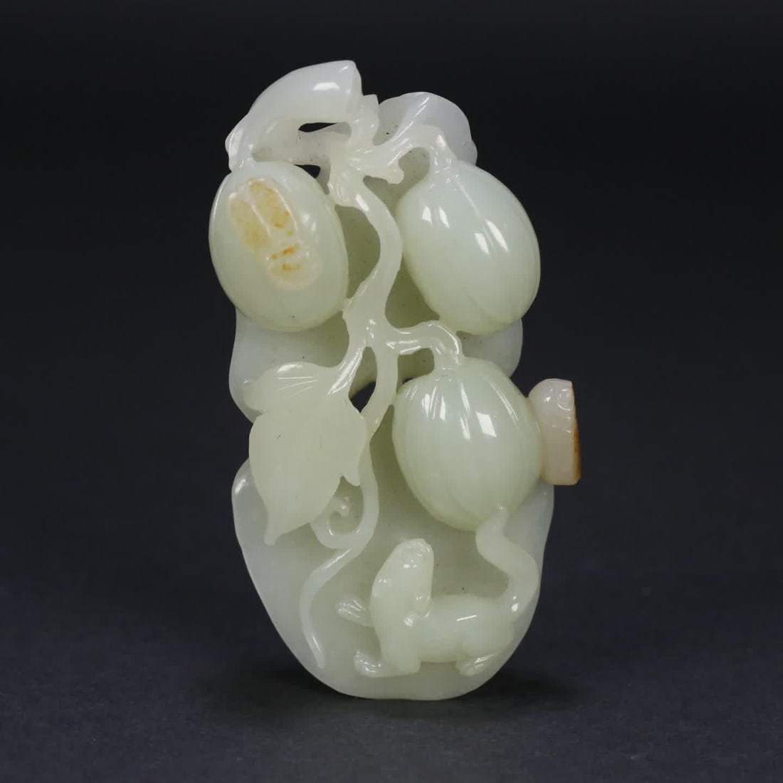 A piece of Qing Dynasty Hetian jade seed material melon and fruit handle (1 of 9)