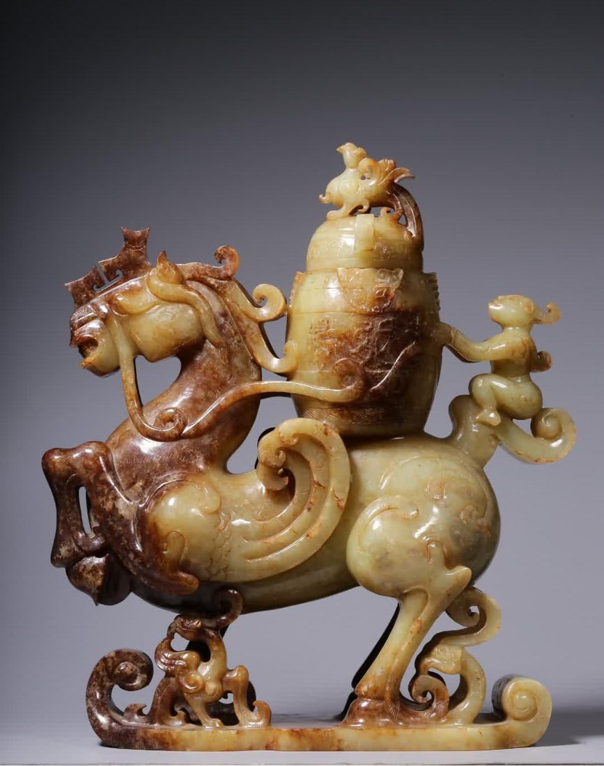 A piece of War Han Dynasty Hetian jade god man driving a flying horse beast face pattern (1 of 9)