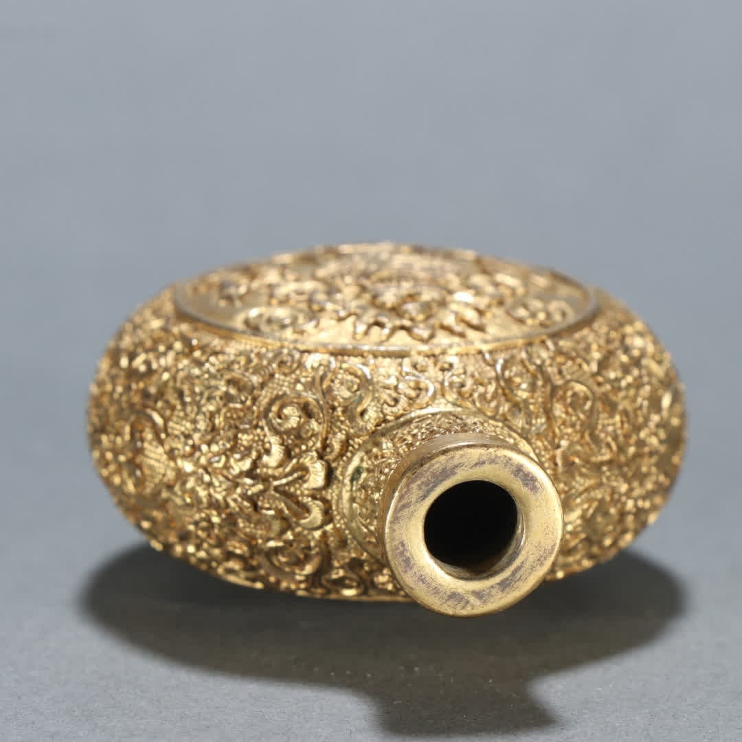 A Qing Dynasty copper gilt eight-treasure pattern snuff bottle - 8