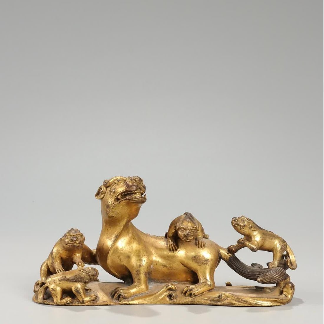 A Qing Dynasty copper gilt raccoon family pen holder: Qing Dynasty copper gilt raccoon family pen holder SIZE: H:8cm L:16.3cm W:4.5cm W:1082g (The Dimensions Of All Batches Are Manually Measured.If You Need More Detailed Information, Please