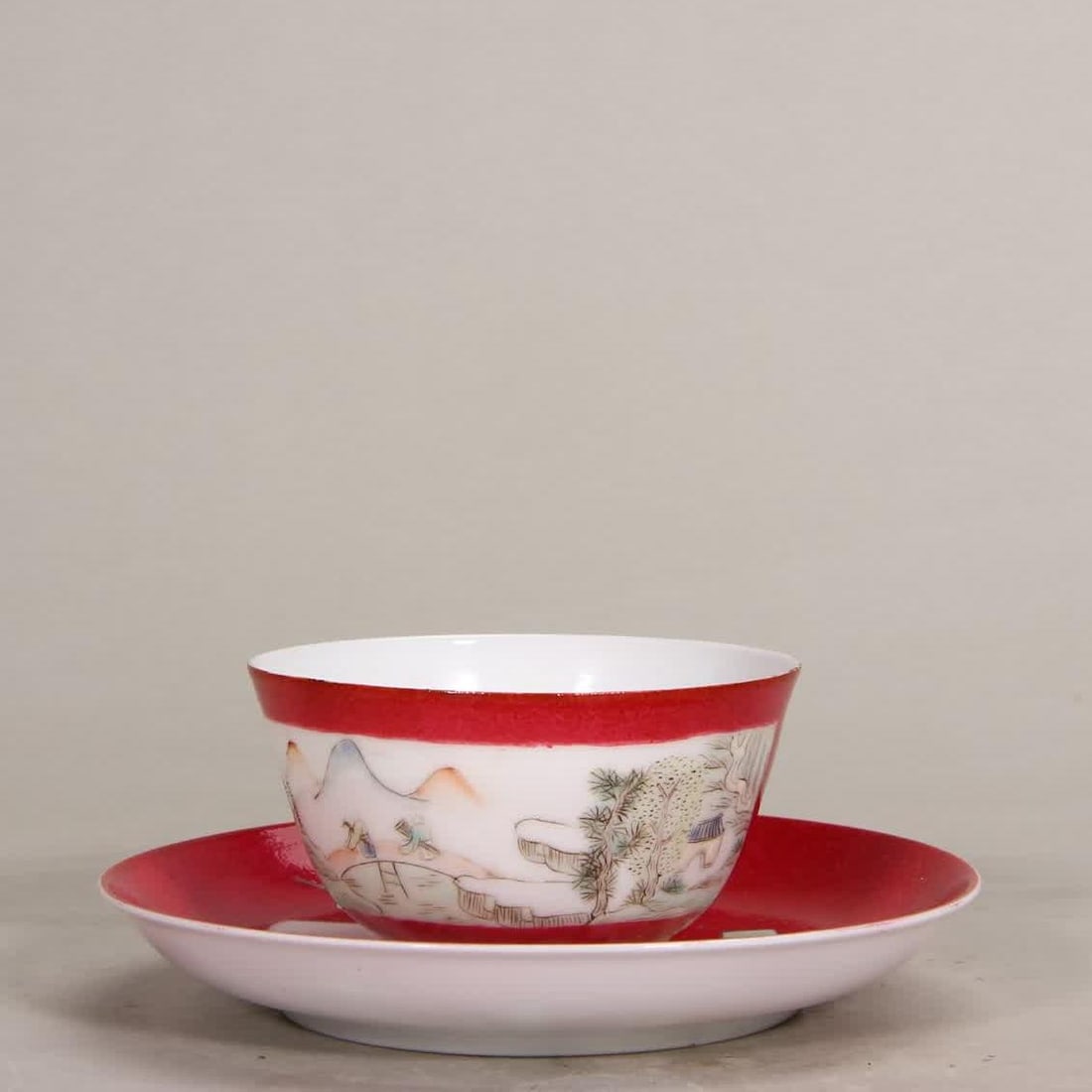 A Qing Dynasty Yongzheng carmine red window landscape cup and saucer (1 of 18)