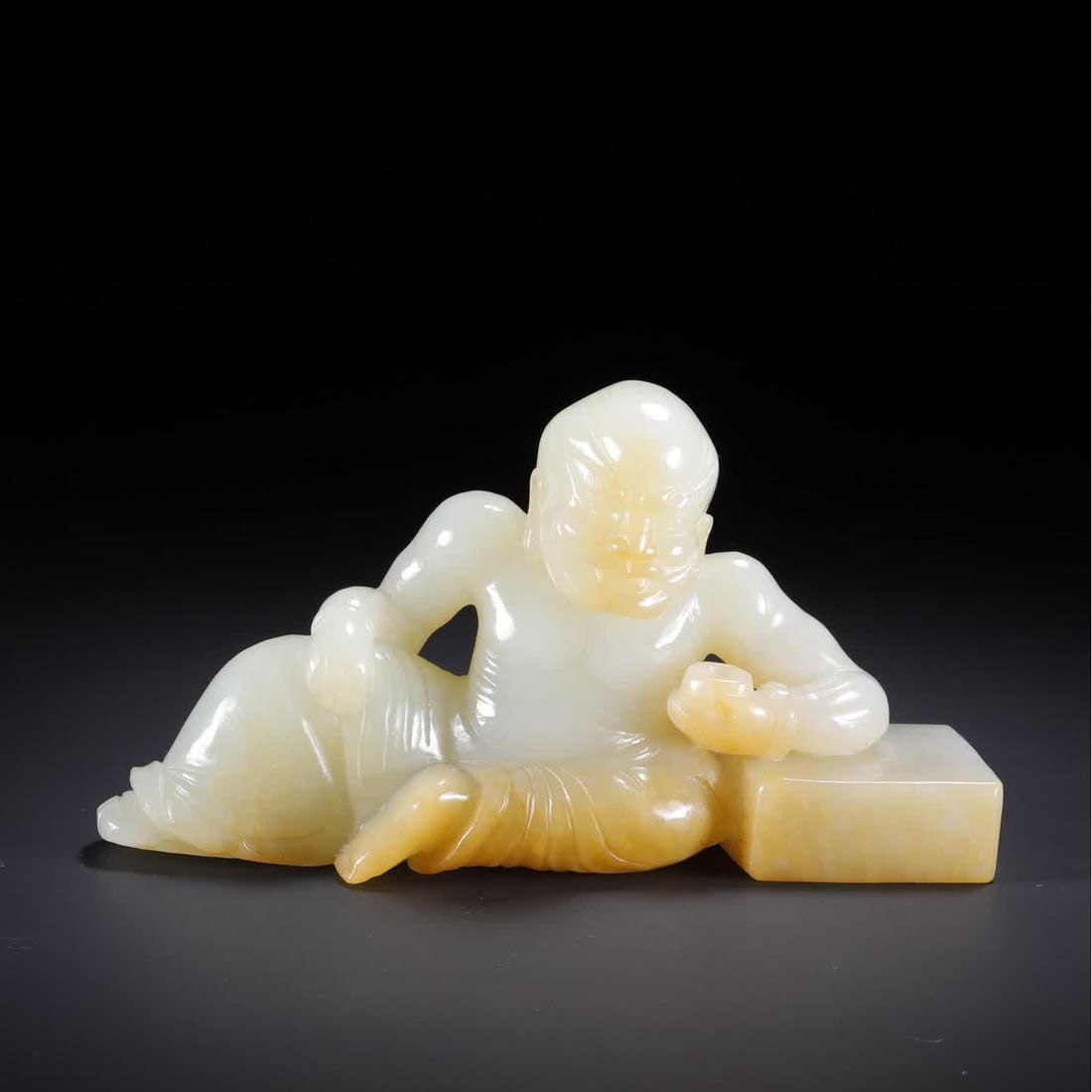 A Qing Dynasty Hetian jade arhat ornament: Qing Dynasty Hetian jade arhat ornament SIZE: 11.5x2.8x6.5cm W:191.5g (The Dimensions Of All Batches Are Manually Measured.If You Need More Detailed Information, Please Contact Our Customer