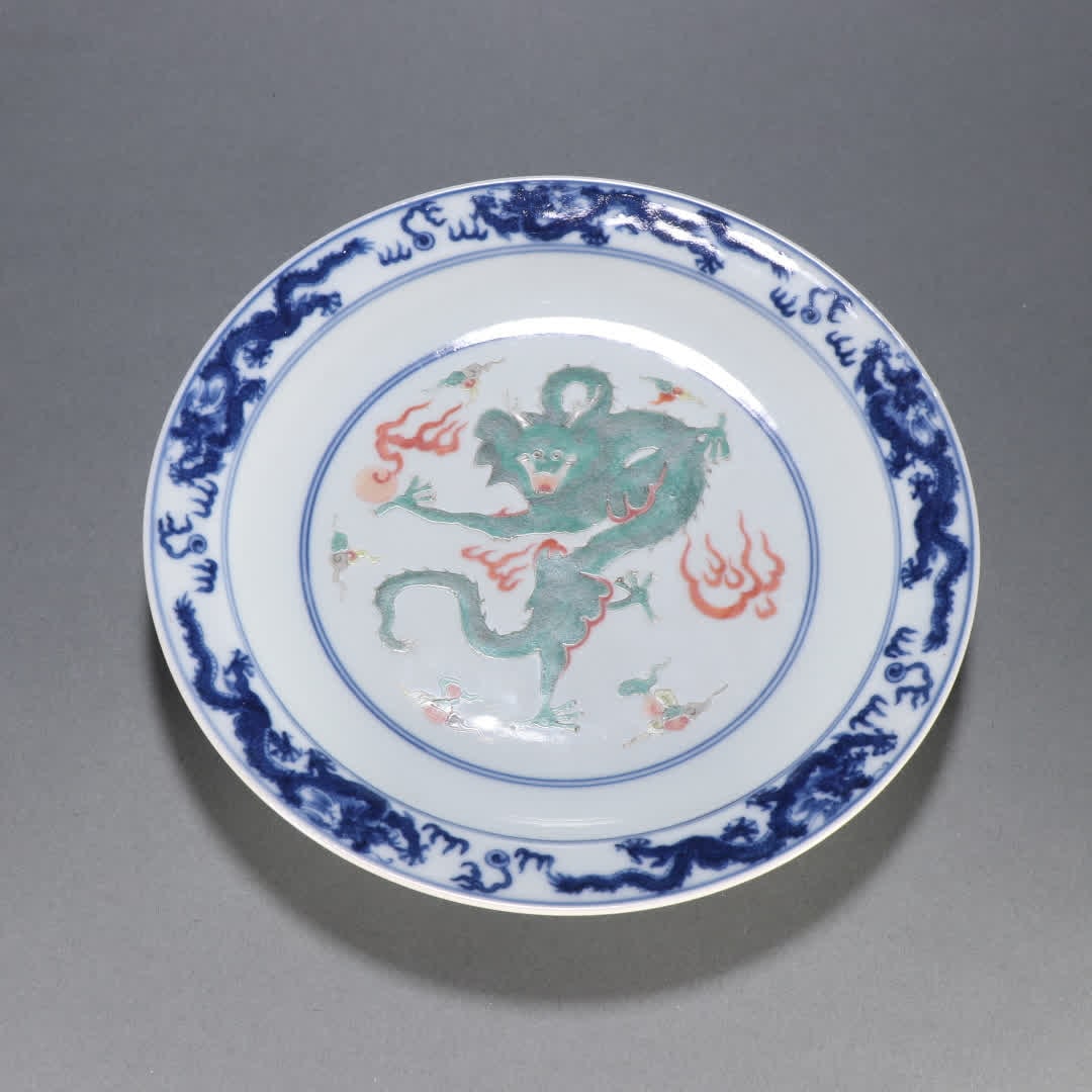 A Qing Dynasty blue and white multicolored dragon pattern plate: Qing Dynasty blue and white colorful dragon pattern plate SIZE: H:3.4cm W:21.2cm (The Dimensions Of All Batches Are Manually Measured.If You Need More Detailed Information, Please Contact Our