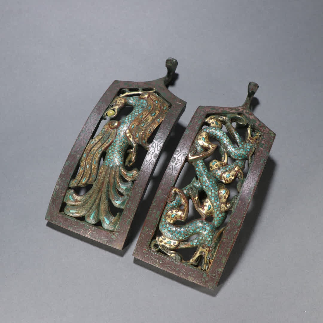 A pair of Han Dynasty bronze vessels inlaid with turquoise dragon and phoenix belt hooks (1 of 9)