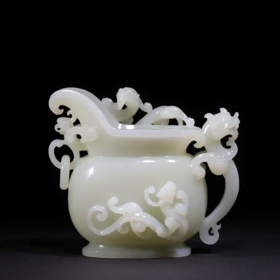 A Qing Dynasty dragon and phoenix auspicious white jade cup (1 of 9)