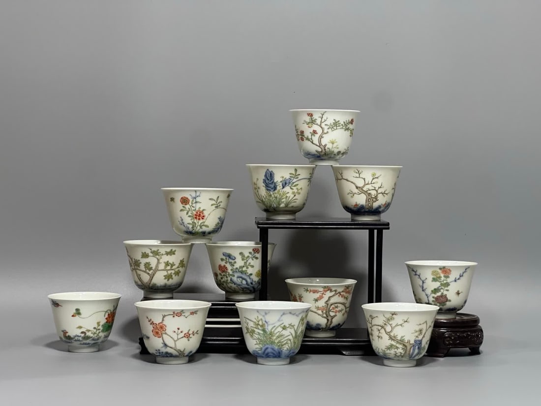 A Qing Dynasty Kangxi system Twelve Flower God Cup: Qing Dynasty Kangxi made the Twelve Flower God Cup SIZE: H: 4.9cm MouthD: 6.7cm Bottom 2.9cm (The Dimensions Of All Batches Are Manually Measured.If You Need More Detailed Information, Please
