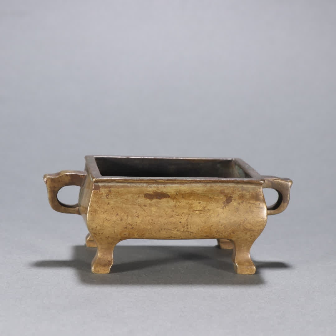 A Qing Dynasty copper tire amphora incense burner (1 of 9)