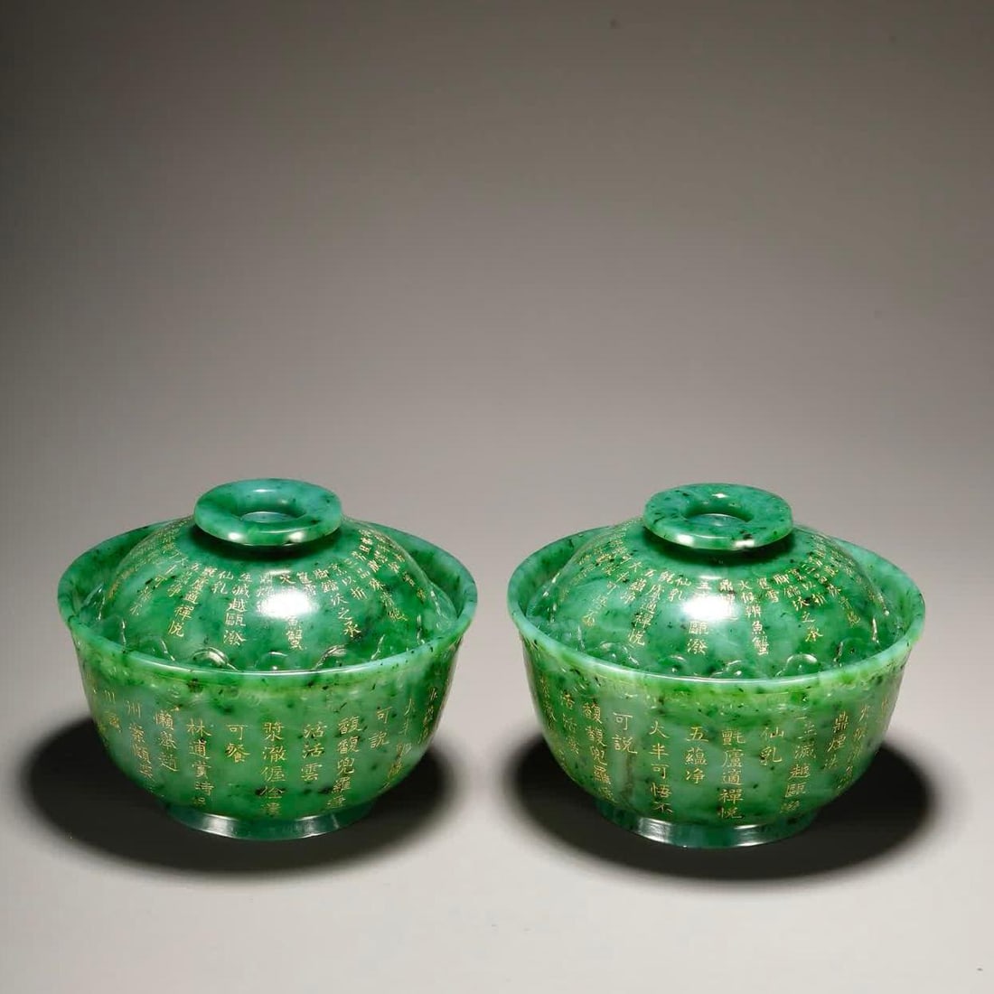 A pair of Hetian jasper Qianlong imperial poem cover bowls: A pair of Hetian jasper Qianlong imperial poem gaiwan SIZE: D:12cm H:6.3cm W:576.2g (The Dimensions Of All Batches Are Manually Measured.If You Need More Detailed Information, Please Contact