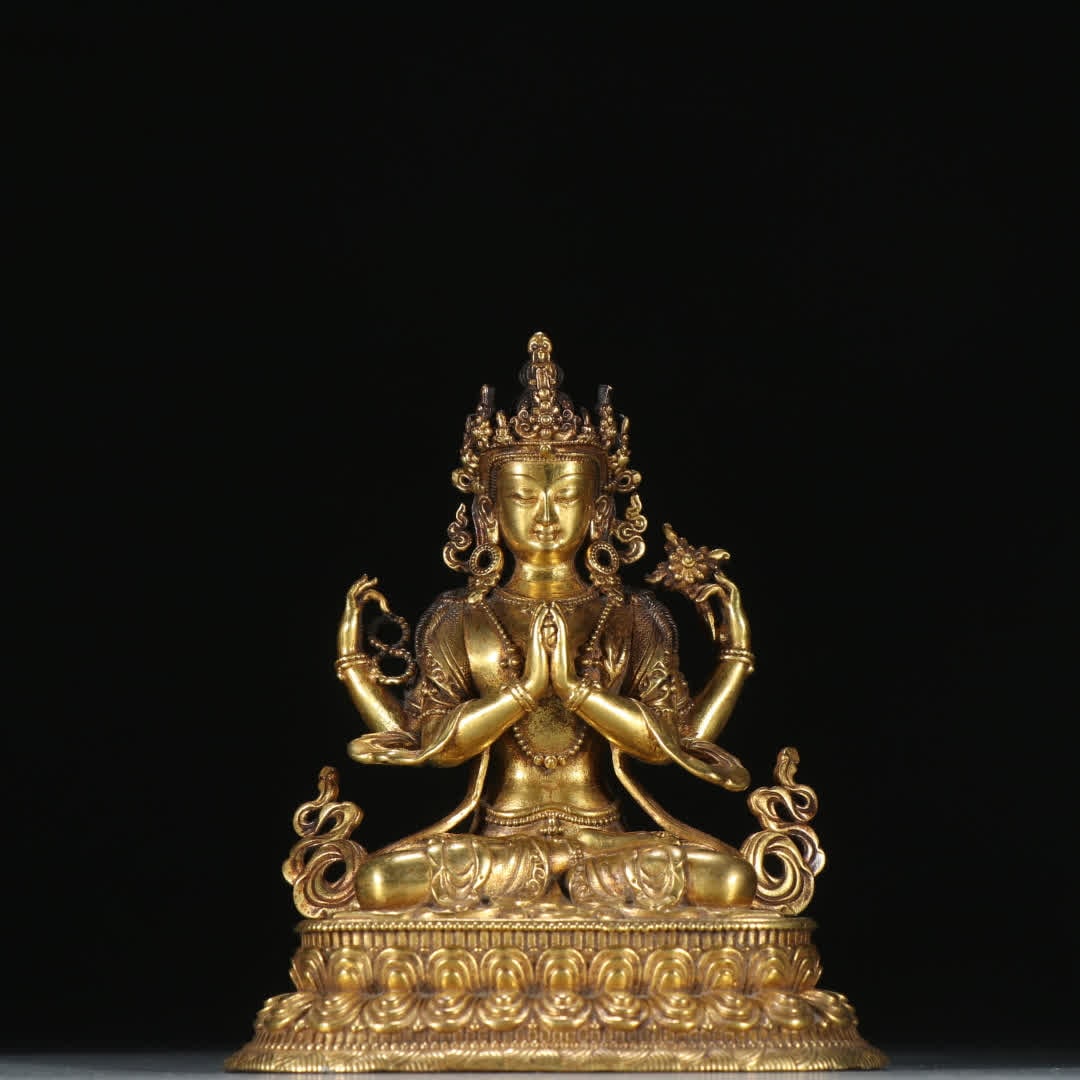 A bronze gilt four-armed Guanyin statue (1 of 9)