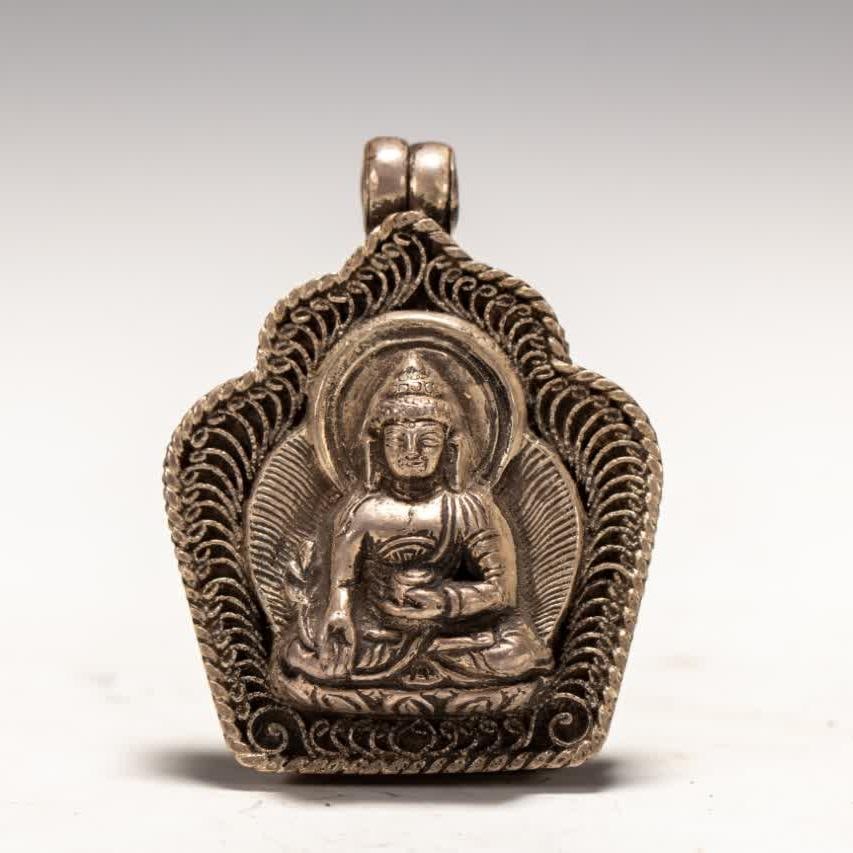 A Qing Dynasty Tibetan silver gawu box (1 of 6)