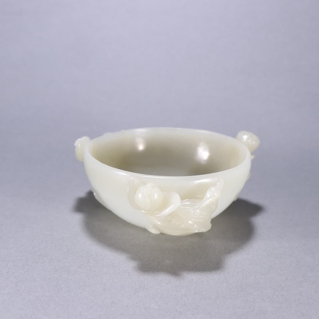 A Qing Dynasty Hetian jade lotus leaf cup (1 of 9)