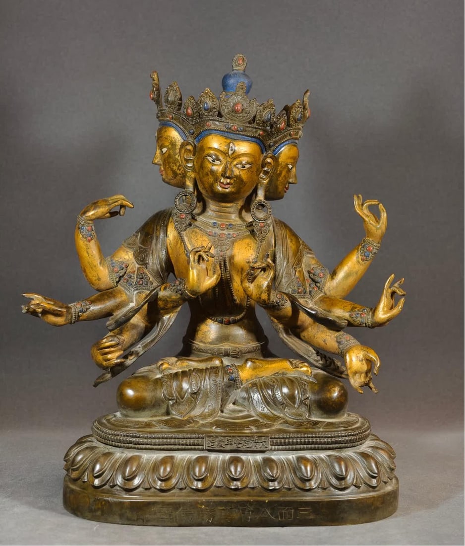 A copper-gilt eight-armed Buddha mother (1 of 9)