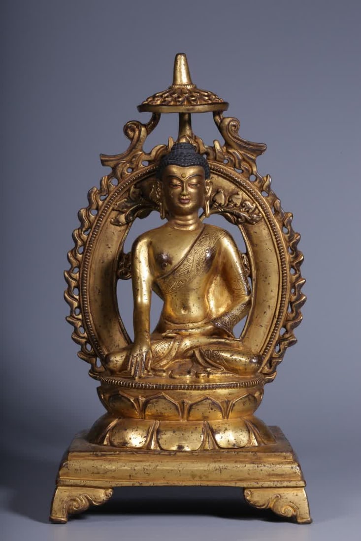 A seated statue of the Buddha in the Qing Dynasty in copper gilt in the Qing Dynasty (1 of 7)