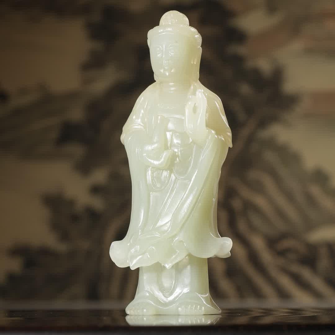 A statue of Guanyin in a Hetian jade clean bottle: Hetian jade clean bottle Guanyin statue SIZE: H:14cm L:5.5cm W:5.5cm T:3.5cm W:310g (The Dimensions Of All Batches Are Manually Measured.If You Need More Detailed Information, Please Contact Our Custo