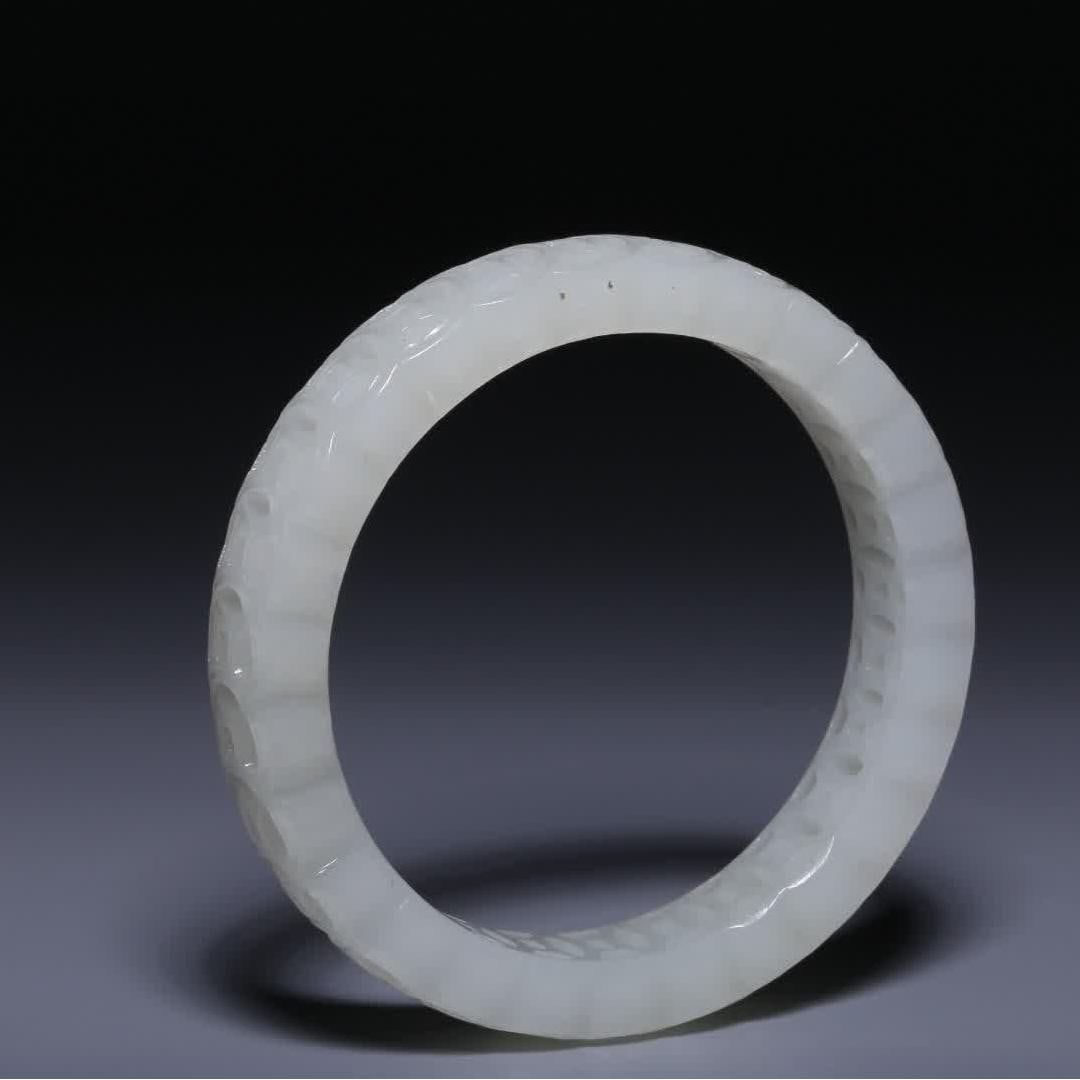 A Qing Dynasty Hetian white jade copper coin pattern bracelet: Qing Dynasty Hetian white jade copper coin pattern bracelet SIZE: Inner diameter 6cm strip W: 1.4cm W: 42g (The Dimensions Of All Batches Are Manually Measured.If You Need More Detailed Information, P
