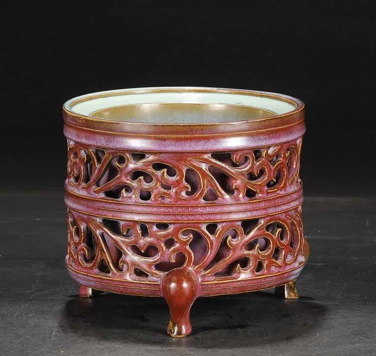 A piece of Northern Song Dynasty Jun kiln grape red glaze hollow floral pattern court royal: Northern Song Dynasty Jun kiln grape red glaze hollow floral pattern court three-legged furnace washing "Qianlong Imperial Title" SIZE: H:15.5cm MouthD:17.5cm (The Dimensions Of All Batches Are
