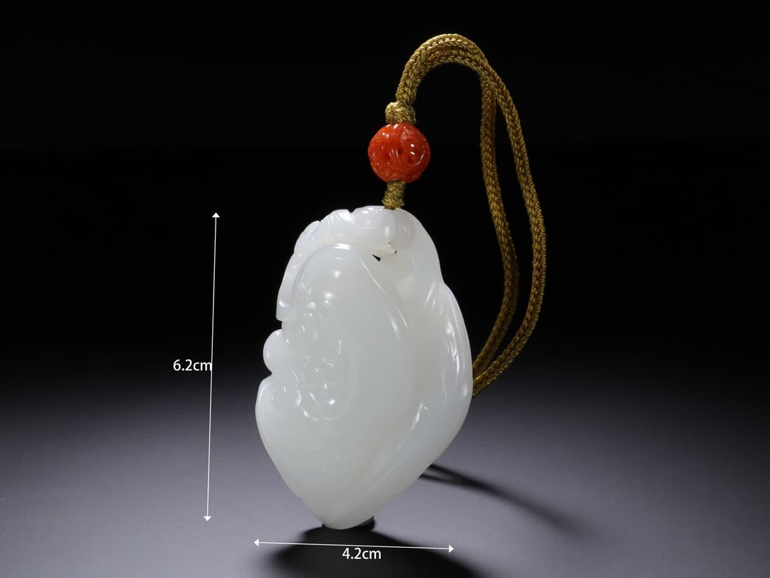 A Qing Dynasty Hetian white jade jade pendant: Qing Dynasty Hetian white jade jade pendant SIZE: H:6.2cm W:4.2cm (The Dimensions Of All Batches Are Manually Measured.If You Need More Detailed Information, Please Contact Our Customer Service Before